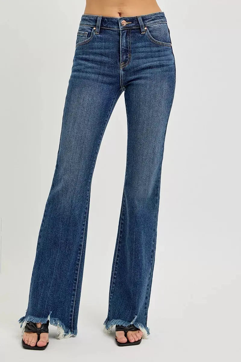 RISEN mid-rise flare jeans in dark wash, frayed hem