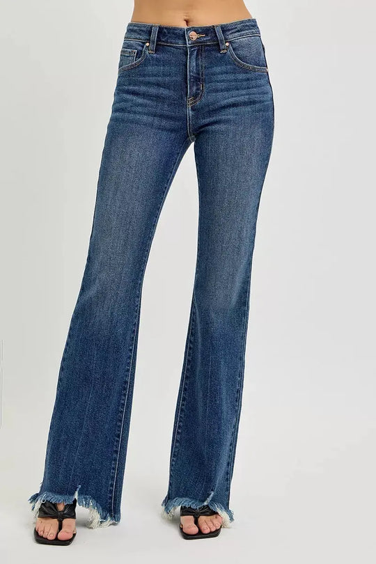RISEN mid-rise flare jeans in dark wash, frayed hem