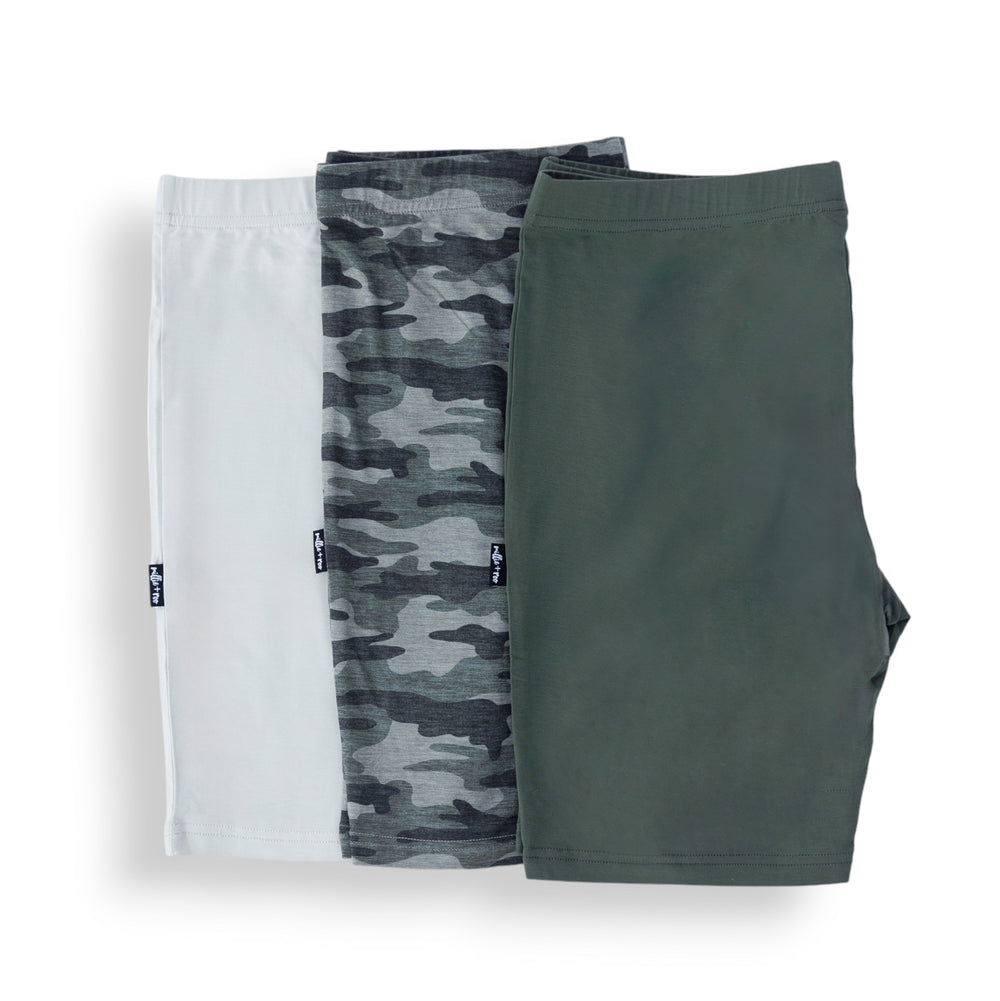 Pack of 3 biker shorts: white/cream, dark camo print, and moss green solid