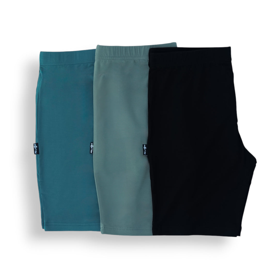3-pack biker shorts set, folded: teal, slate gray and black shorts.