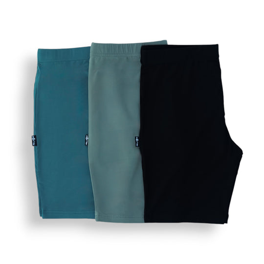3-pack biker shorts set, folded: teal, slate gray and black shorts.
