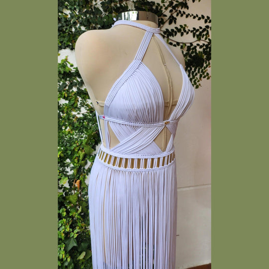 Selene ivory dress back angle: cross straps over open triangular back, vertical fringe