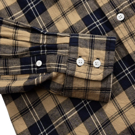 Poignet de chemise flanelle à carreaux avec patte boutonnée et couture de manche