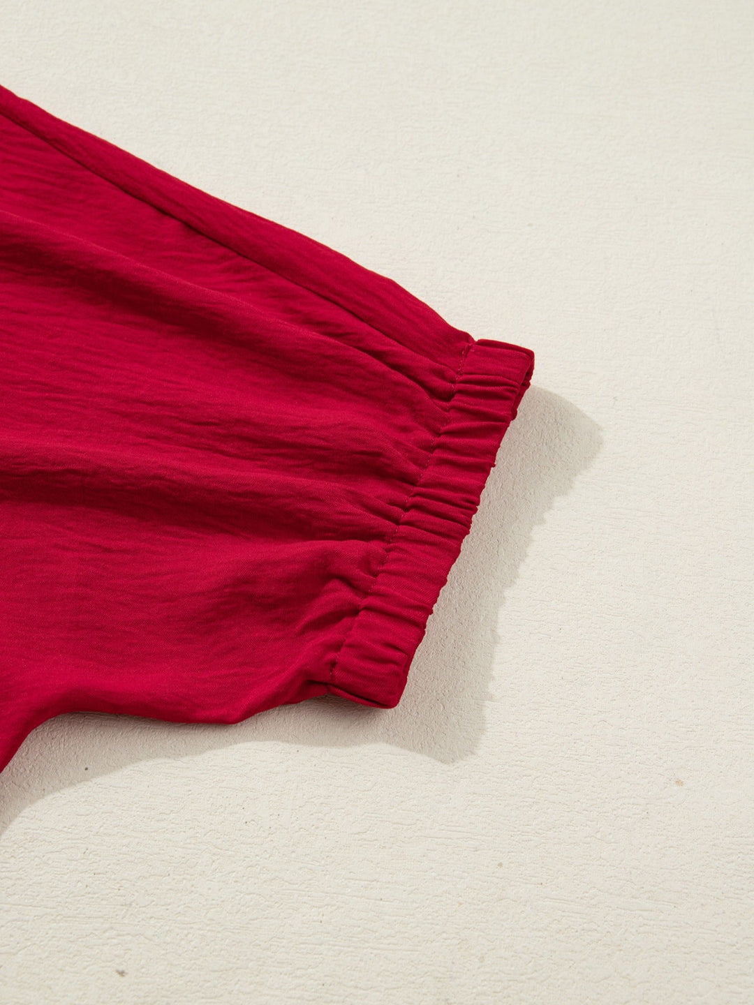 Deep Red half-sleeve blouse sleeve cuff with gathered elastic detail