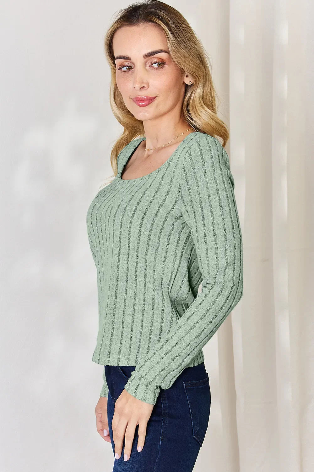 Light green ribbed long-sleeve T-shirt shown from the side