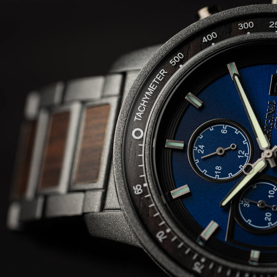 Close-up of tachymeter bezel on Ford Barrel Chrono 45mm watch with blue center dial