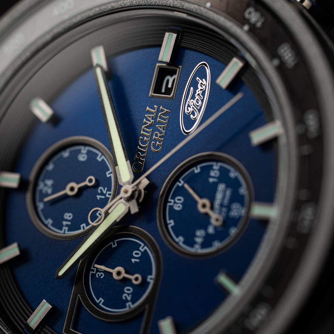 Ford Barrel Chrono 45mm watch dial close-up, blue chronograph layout with engraved branding