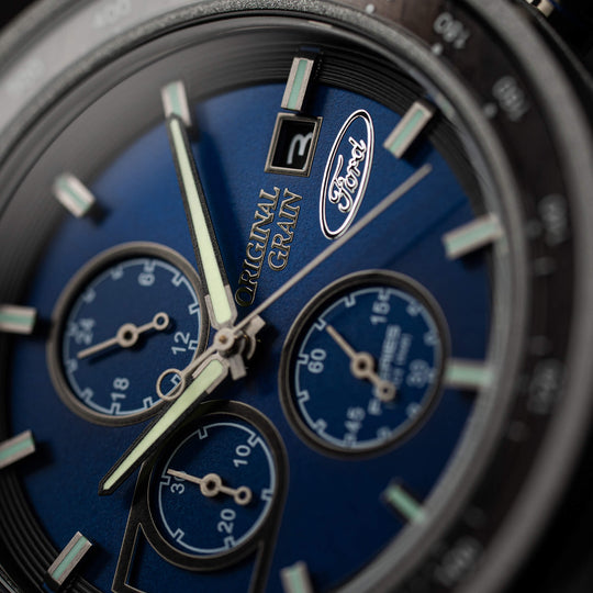 Ford Barrel Chrono 45mm watch dial close-up, blue chronograph layout with engraved branding
