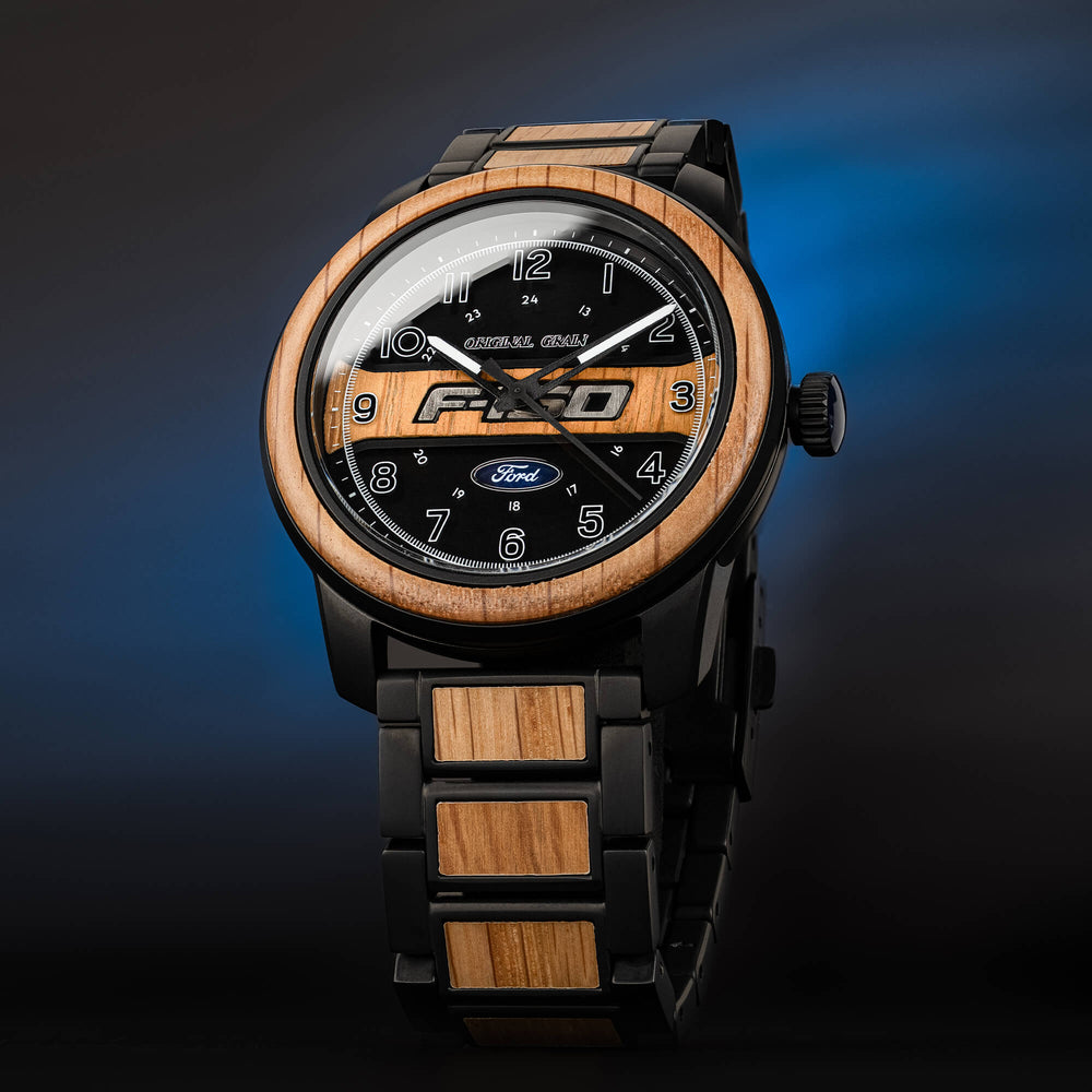 Ford Barrel 44 mm watch face with wood ring and black metal bracelet, date window on dial