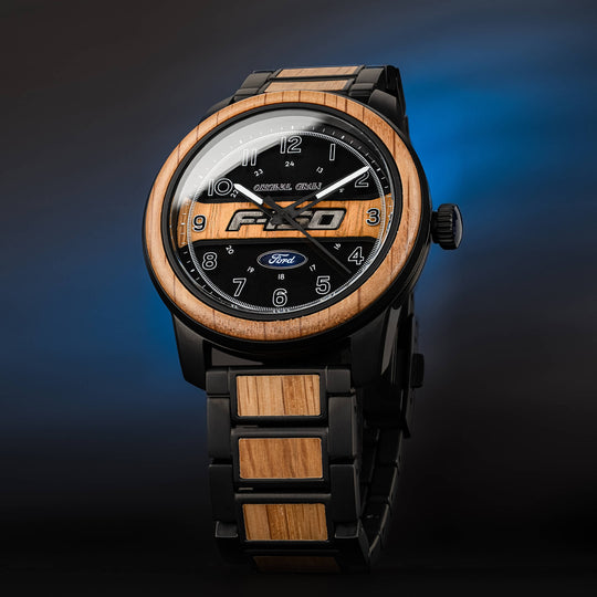 Ford Barrel 44 mm watch face with wood ring and black metal bracelet, date window on dial