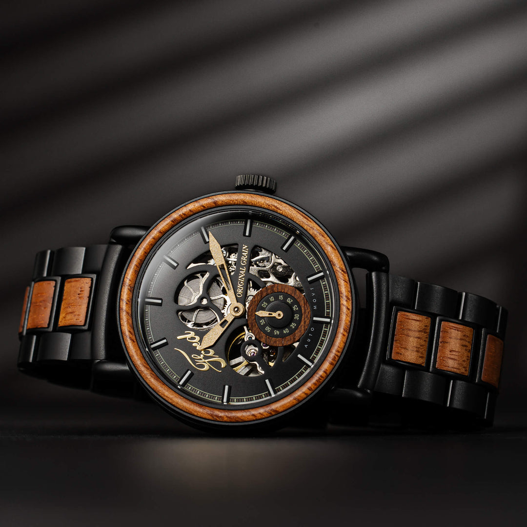 Automatic 40mm watch on black strap with rectangular wood inlays, angled view