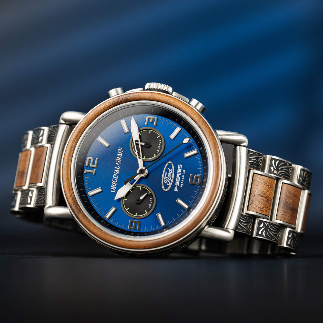 Close-up Ford chrono 44mm mechanical watch, blue dial, subdials, patterned bezel, metal band