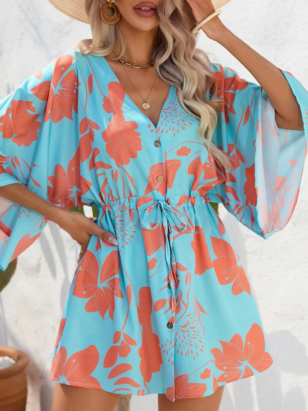 Sky-blue printed dress with gathered drawstring waist and button placket, loose fit
