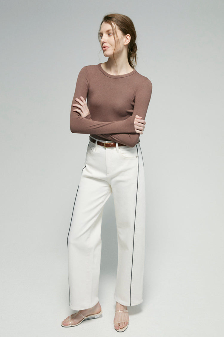 White Crush Curve ankle jeans with brown belt and contrast seam details