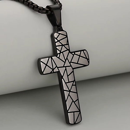 Geometric Cross Necklace: black geometric cross pendant with white mosaic on cord