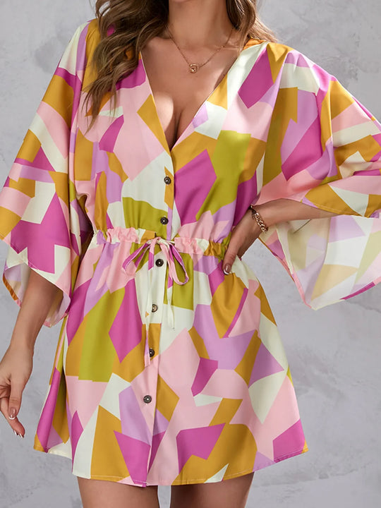 Color block mini dress with drawstring waist, button front, and flutter sleeves