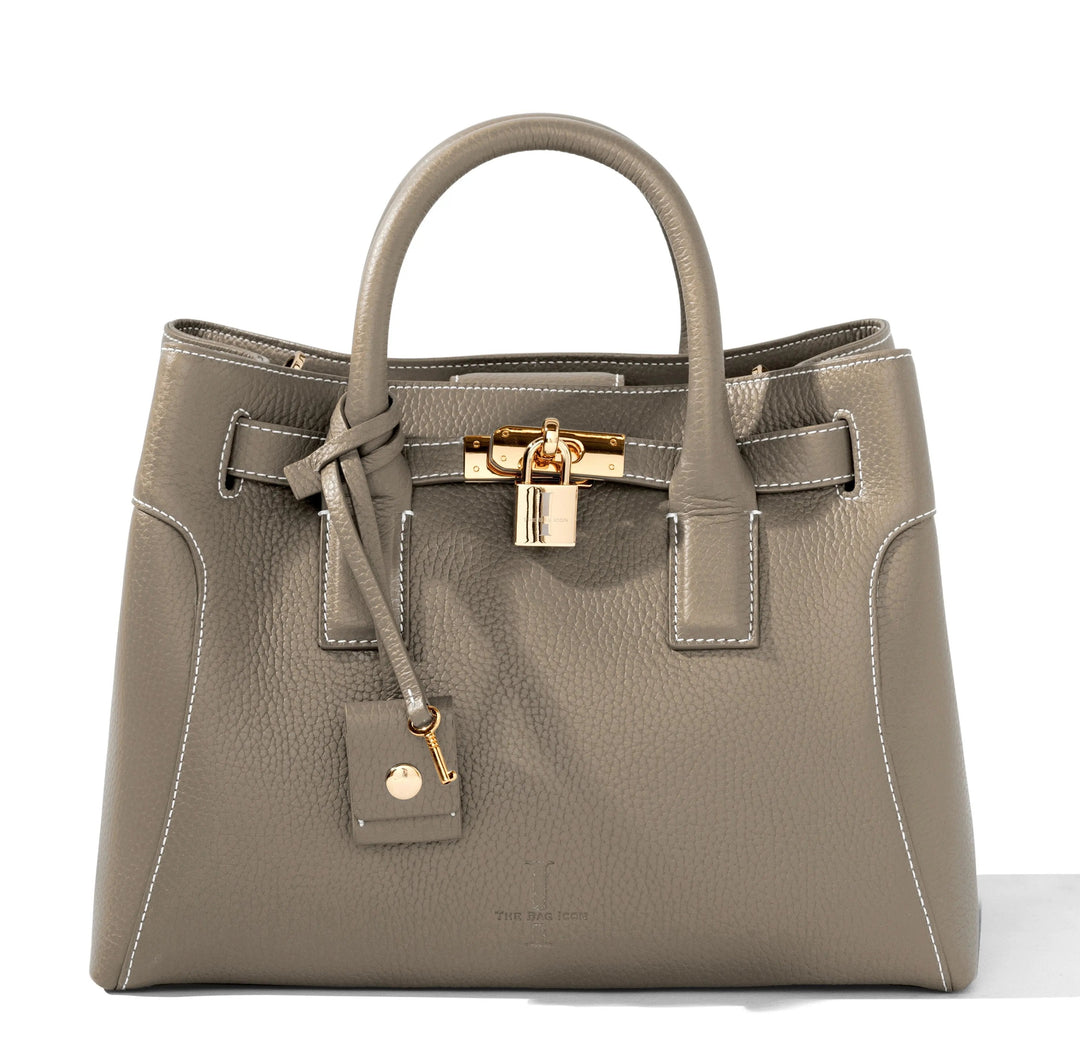 Taupe grained leather tote satchel with structured front pockets and gold clasp