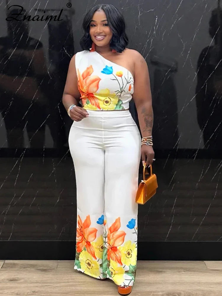 Znaiml Flower print two-piece set: one-shoulder crop top with wide-leg pants, white base
