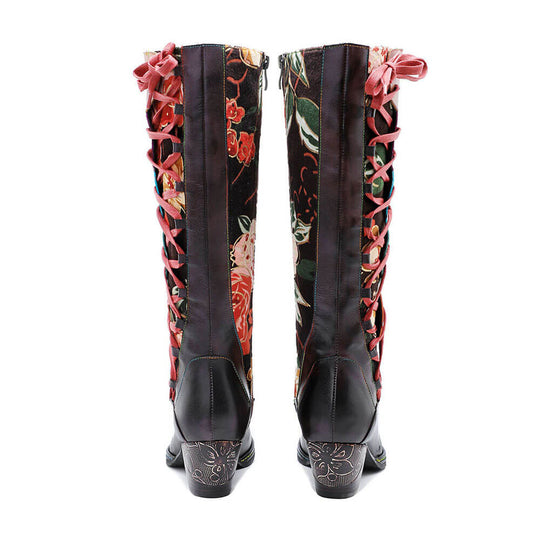 Back view of tall leather lace-up boots with red laces and floral side panels