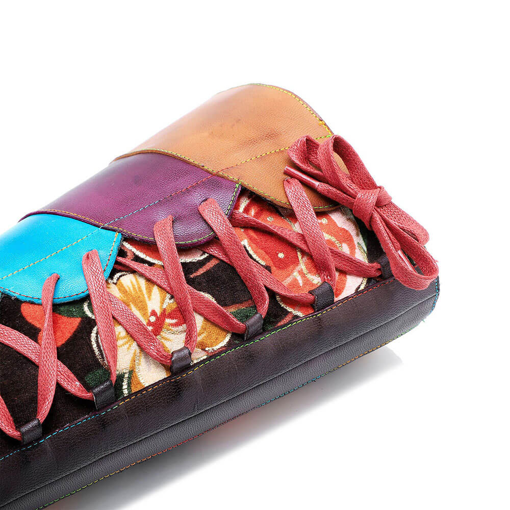 Colorful leather lace-up boots with patterned panels and contrast stitching