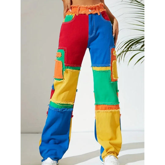 Patchwork denim jeans in red, blue, green, and yellow with high waist and frayed hem