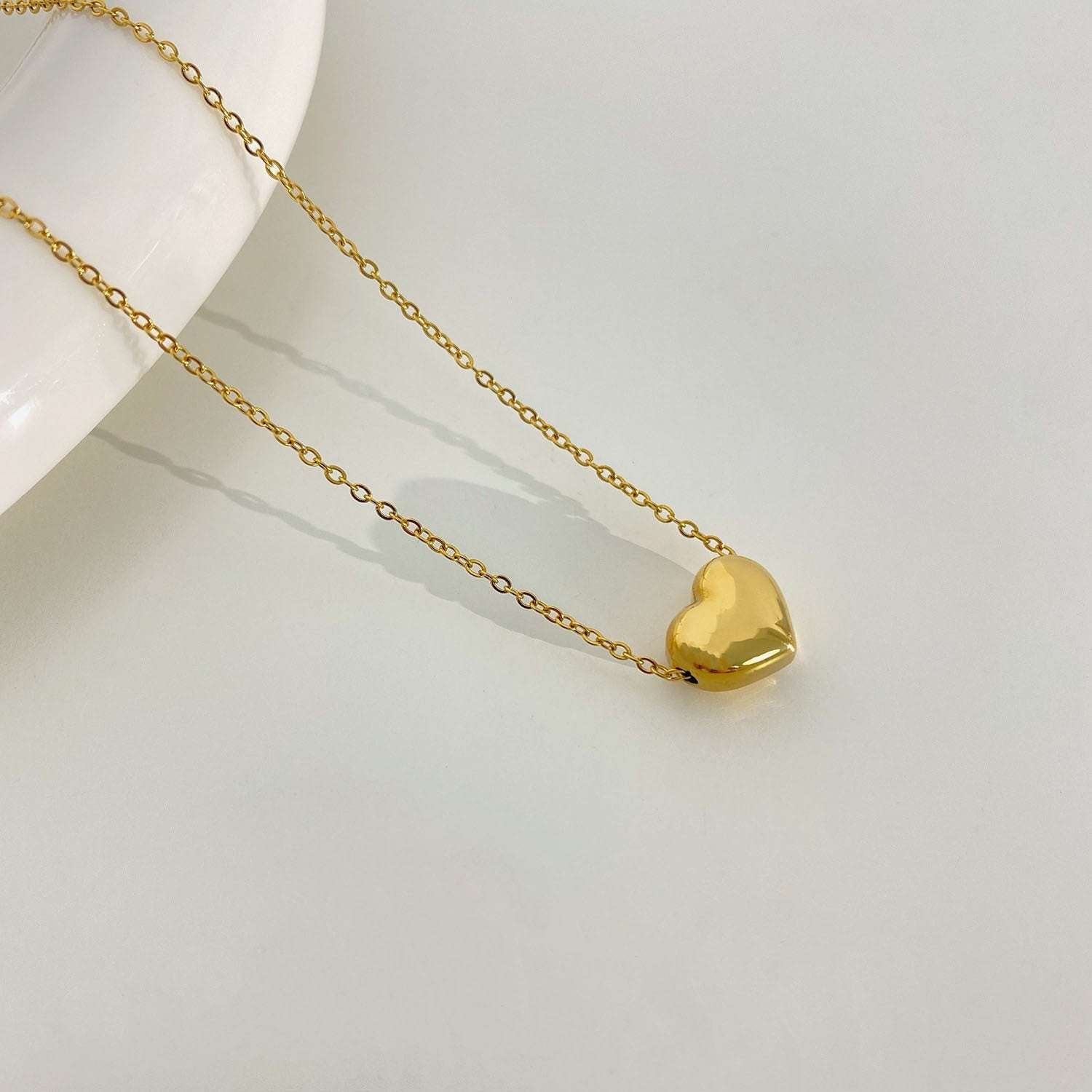 TRIDIUM HEART gold-tone chain necklace with heart pendant