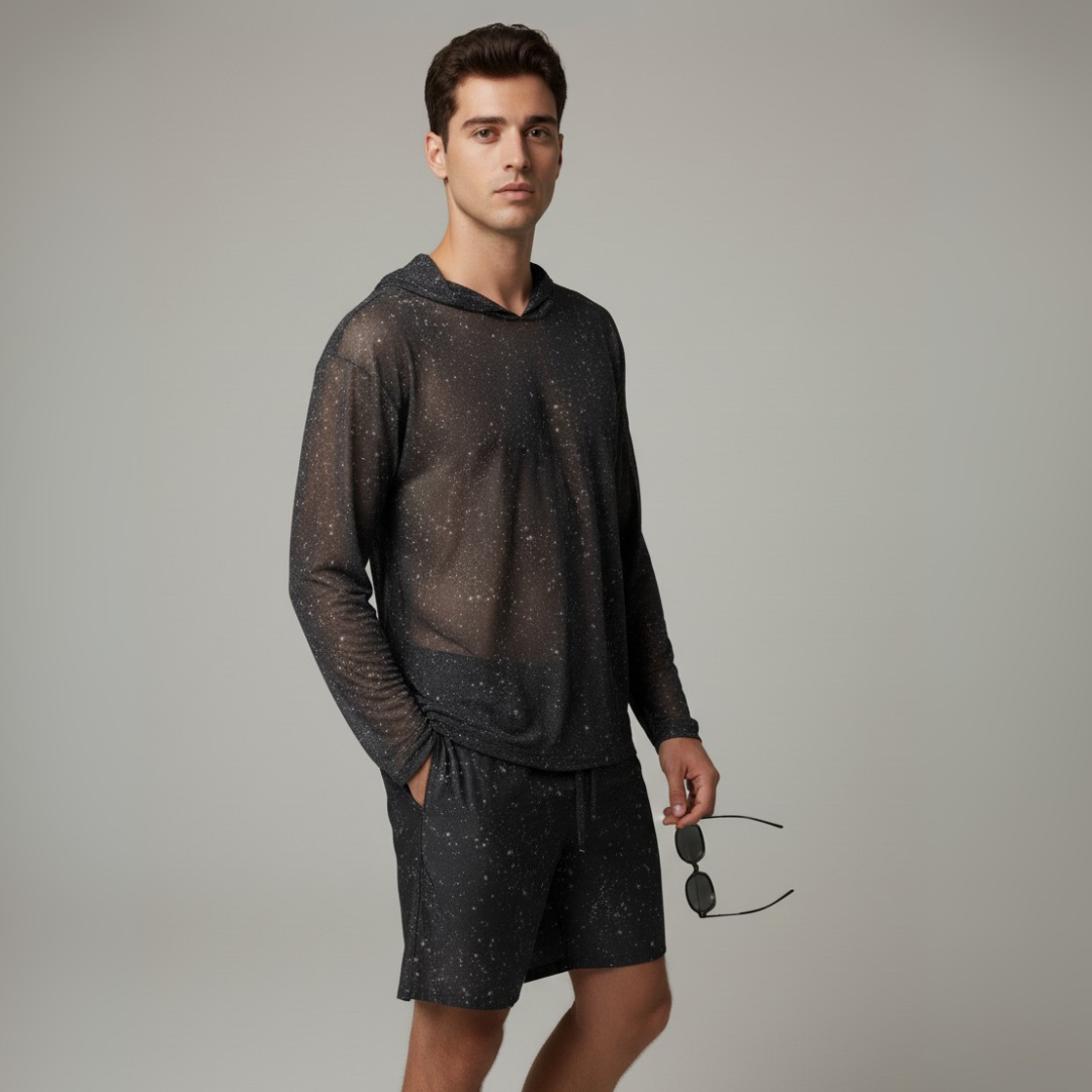 Night Sky swim trunks, dark speckled pattern, side view with elastic waistband