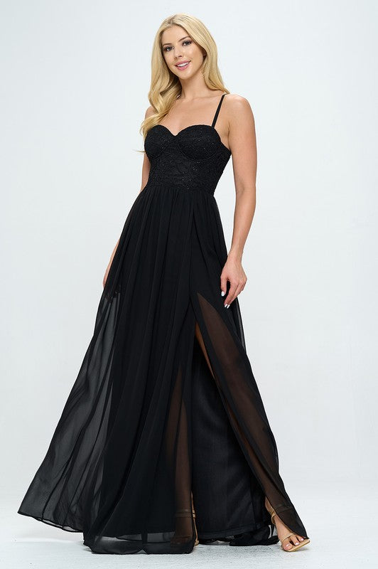 Denim black maxi dress side view with lace bustier and flowing pleated skirt