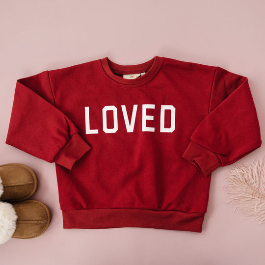 Red sweatshirt with bold &