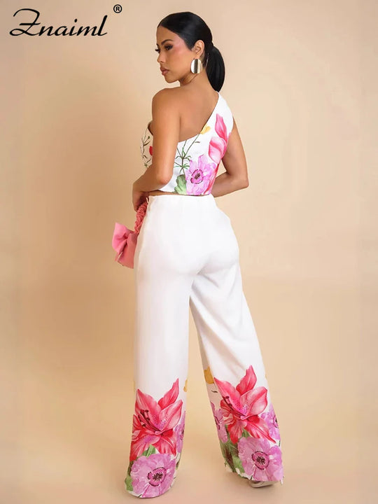 Flower print two-piece set with one-shoulder crop top and wide-leg pants, white base