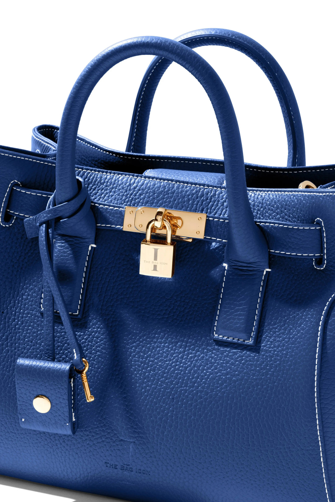 THE SHARON CLAUDIA Handtasche Royal Blue, vordere Kantennaht und Schließe mit Logoplatte