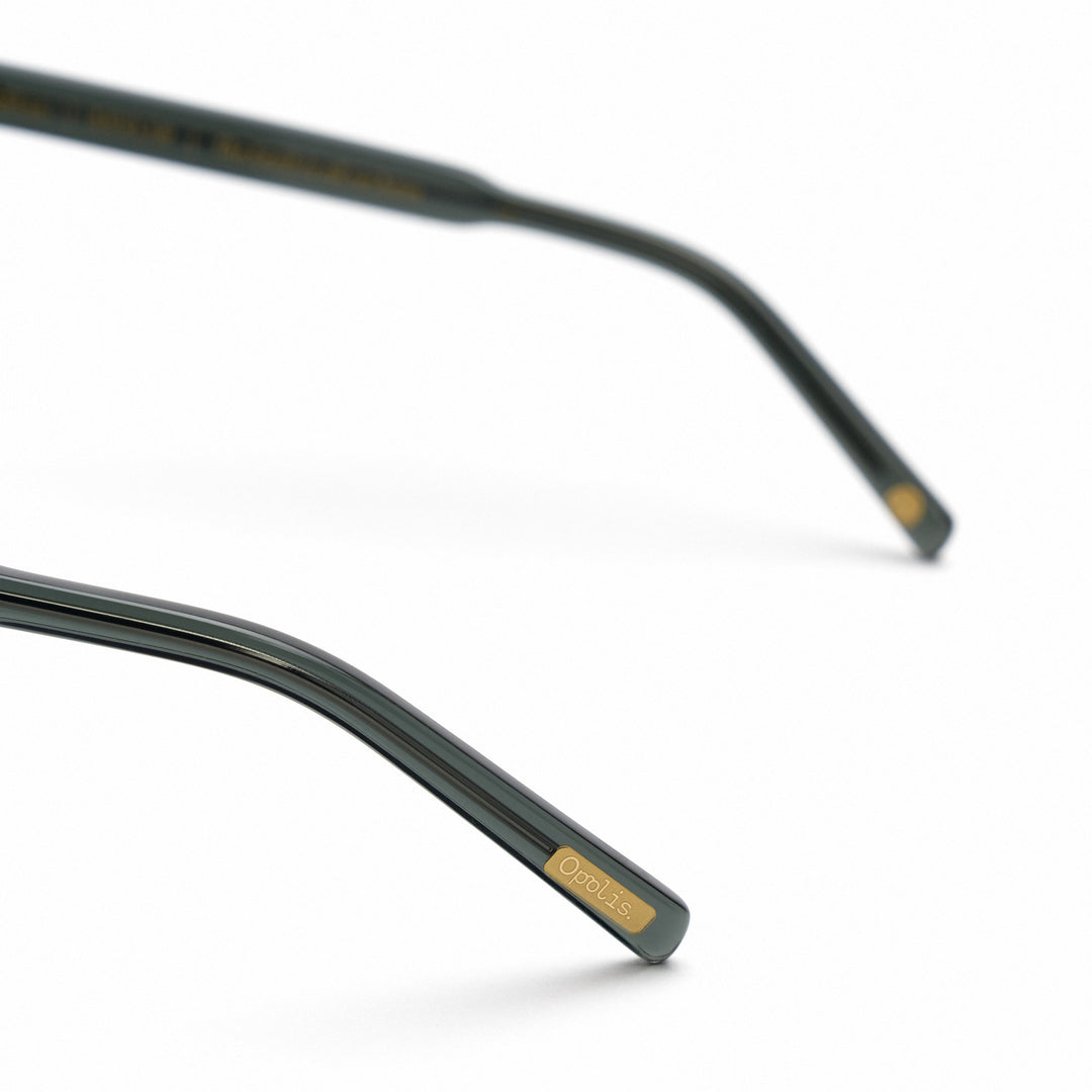 Devlin sunglasses arm tip; dark green with gold opolisoptics mark