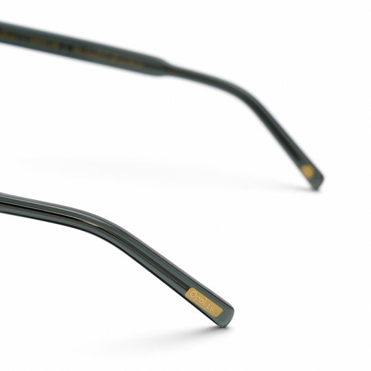 Devlin sunglasses arm tip; dark green with gold opolisoptics mark