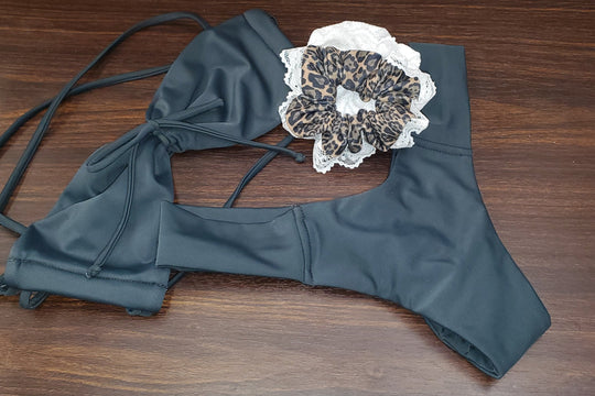 Charcoal cheeky swim bottoms, lace-trim detail and string ties
