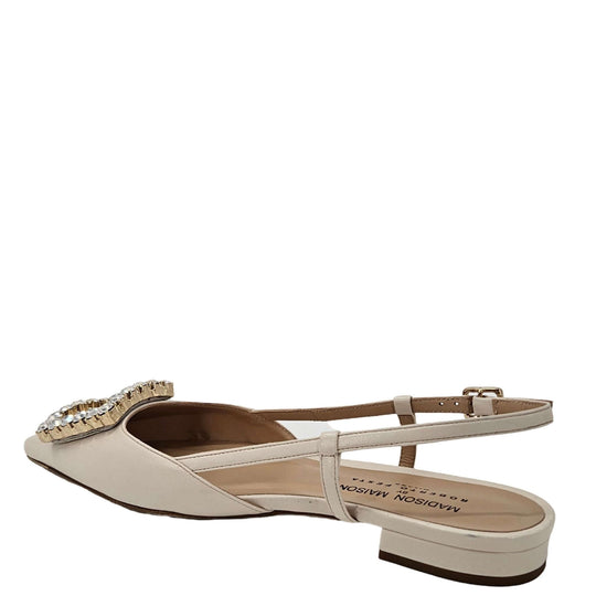 Cream leather sling-back flat side view with rhinestone embellishment and low heel