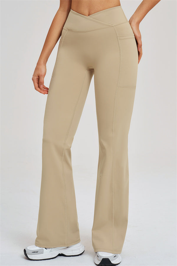 Almond flared leggings, side view, high-rise waist and subtle panel seams