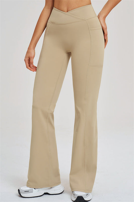 Almond flared leggings, side view, high-rise waist and subtle panel seams