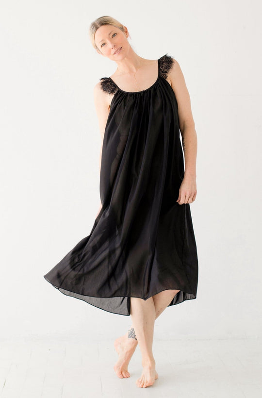 Black extended-size long nightgown with lace shoulder detail and tiered skirt