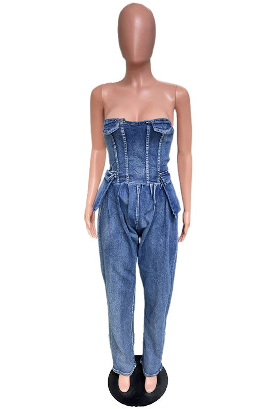 Front view on mannequin: navy strapless denim jumpsuit with corset bodice and drawstring waist