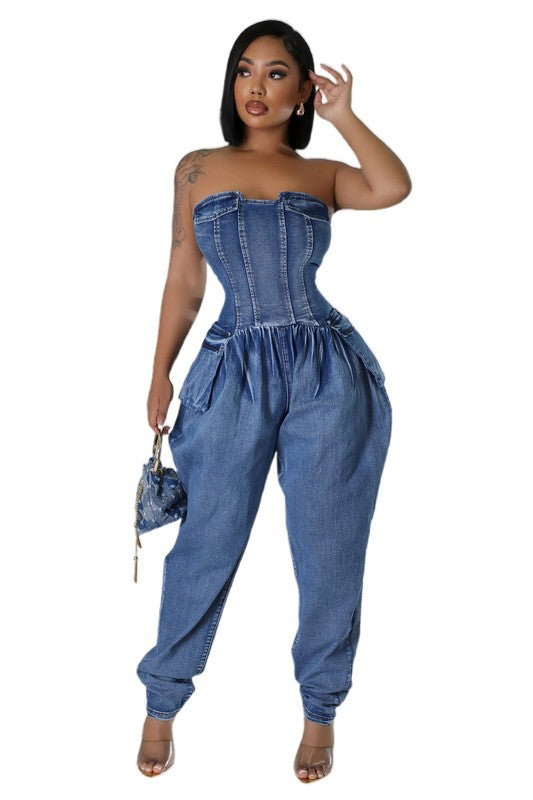 Navy strapless denim jumpsuit with gathered waist and tapered jogger cuffs
