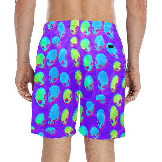 Back view purple alien swim shorts with multicolor alien pattern and small logo