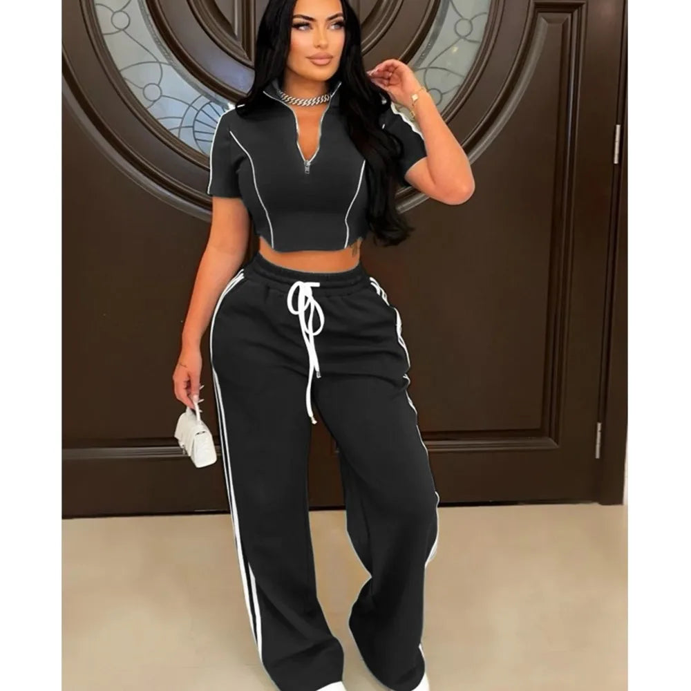 Schwarzes 2-teilges Set mit kurzem Reißverschluss-Hoodie und langen Jogginghosen mit Streifen