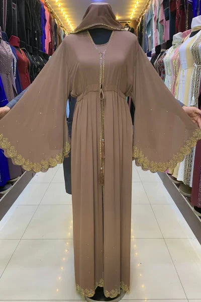 Nemesia abaya in taupe with gold trim, keyhole-style neckline and long tassel placket