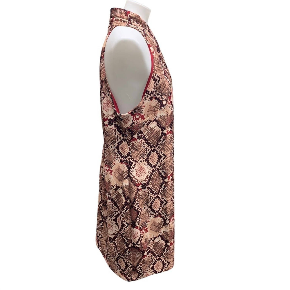 Snake-skin print sheath dress, sleeveless side profile, brown-orange camo