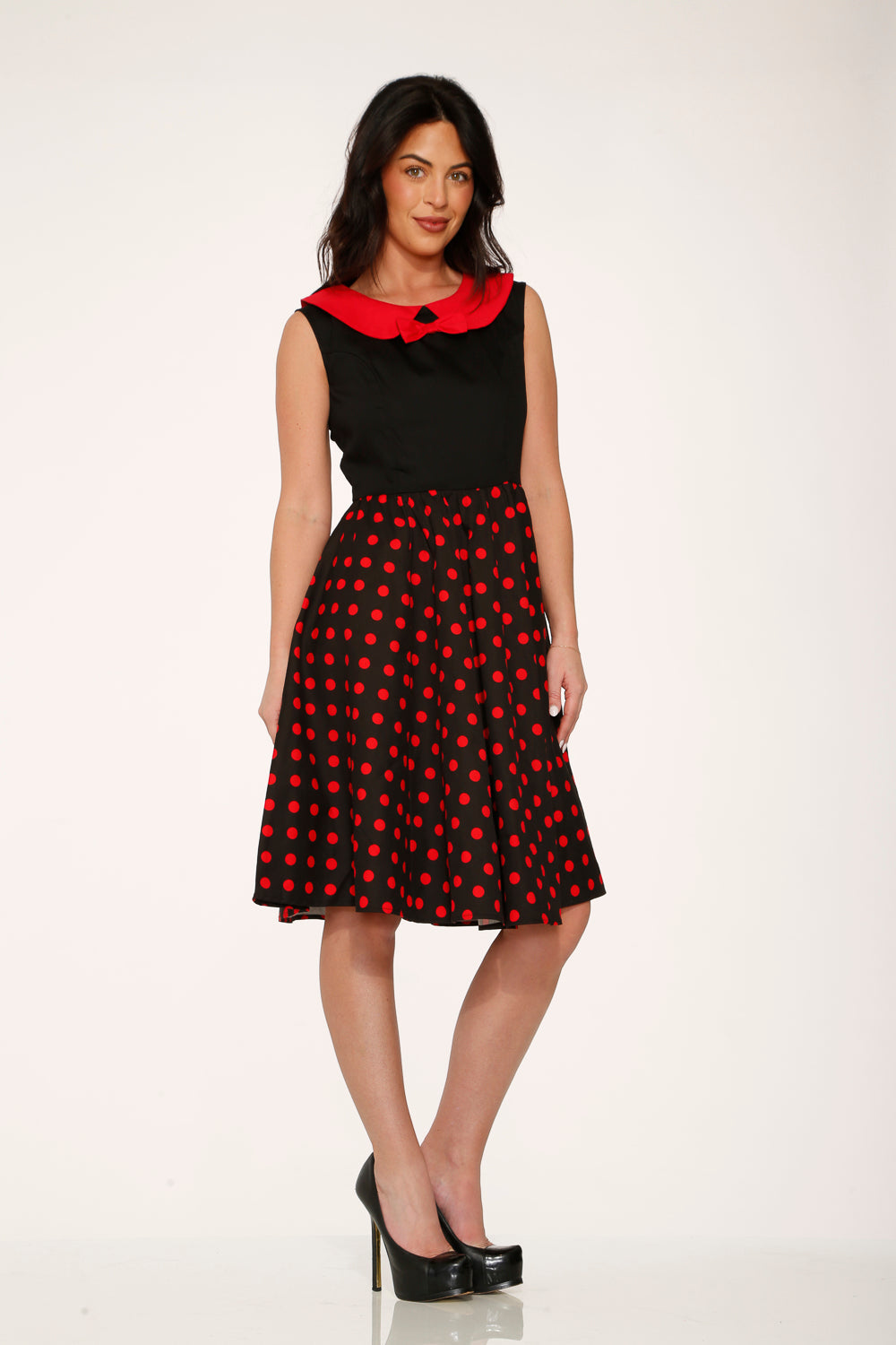 Black dress with red polka dots and red collar, A-line swing silhouette
