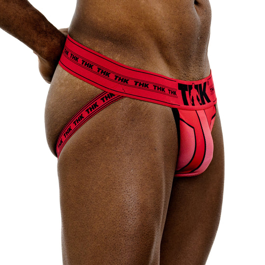Red Hero Jock jockstrap side view with wide waistband and textured front panels