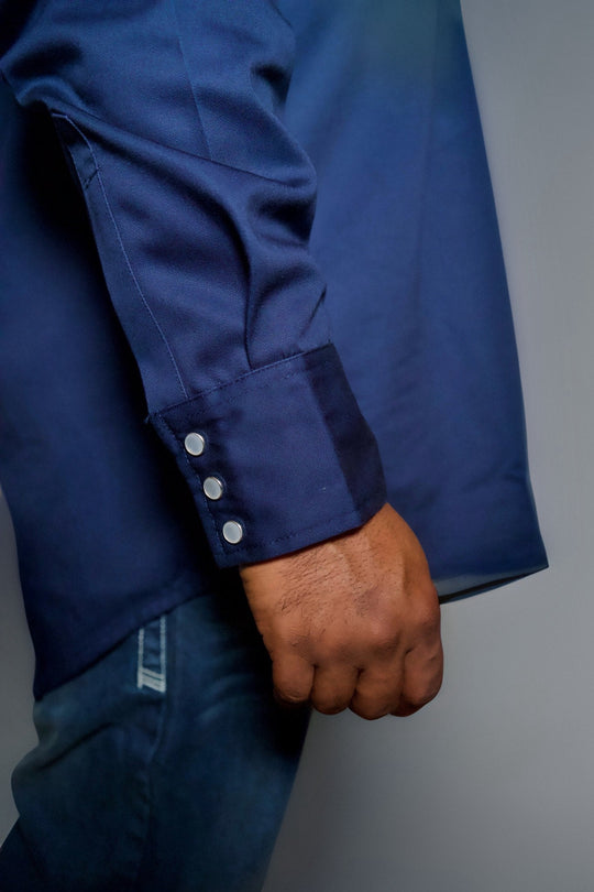 Navy western FR shirt cuff with pearl snaps and stitched pocket detail
