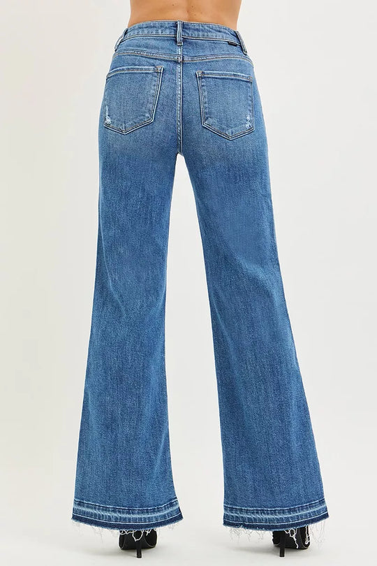 Medium wash high-rise wide-leg jeans with back pockets and frayed hem