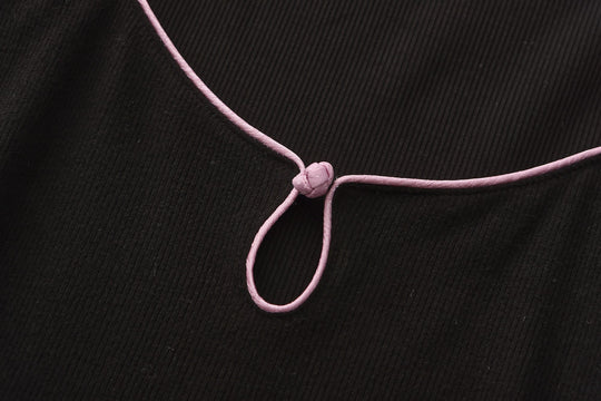 Gao cutout maxi dress strap detail, pink cord tie at neckline on black fabric