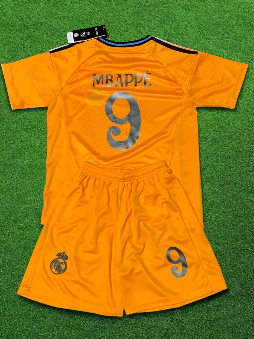 Orange MBAPPE 9 jersey top with matching shorts, Real Madrid crest on left